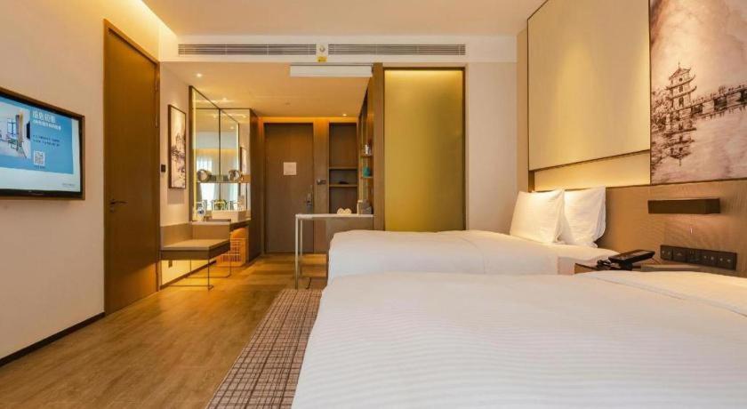 Wanda Jin Baise Hotel Bagian luar foto