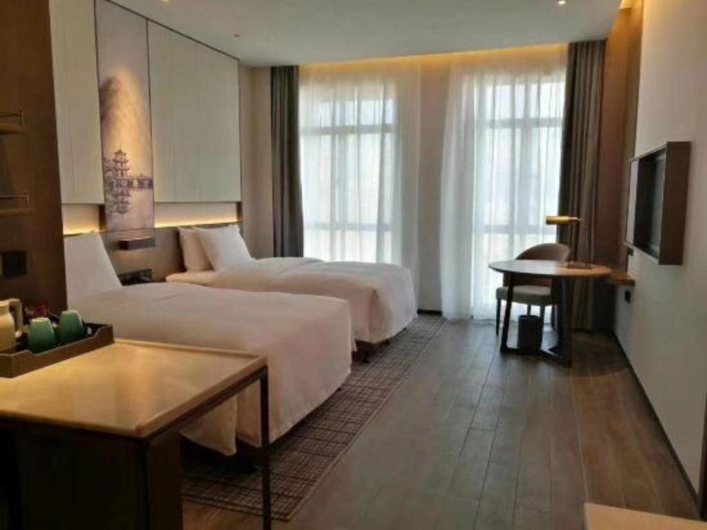 Wanda Jin Baise Hotel Bagian luar foto